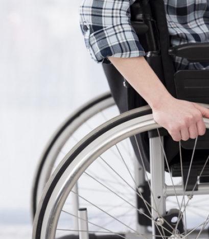 close-up-invalid-person-wheelchair_23-2148476559